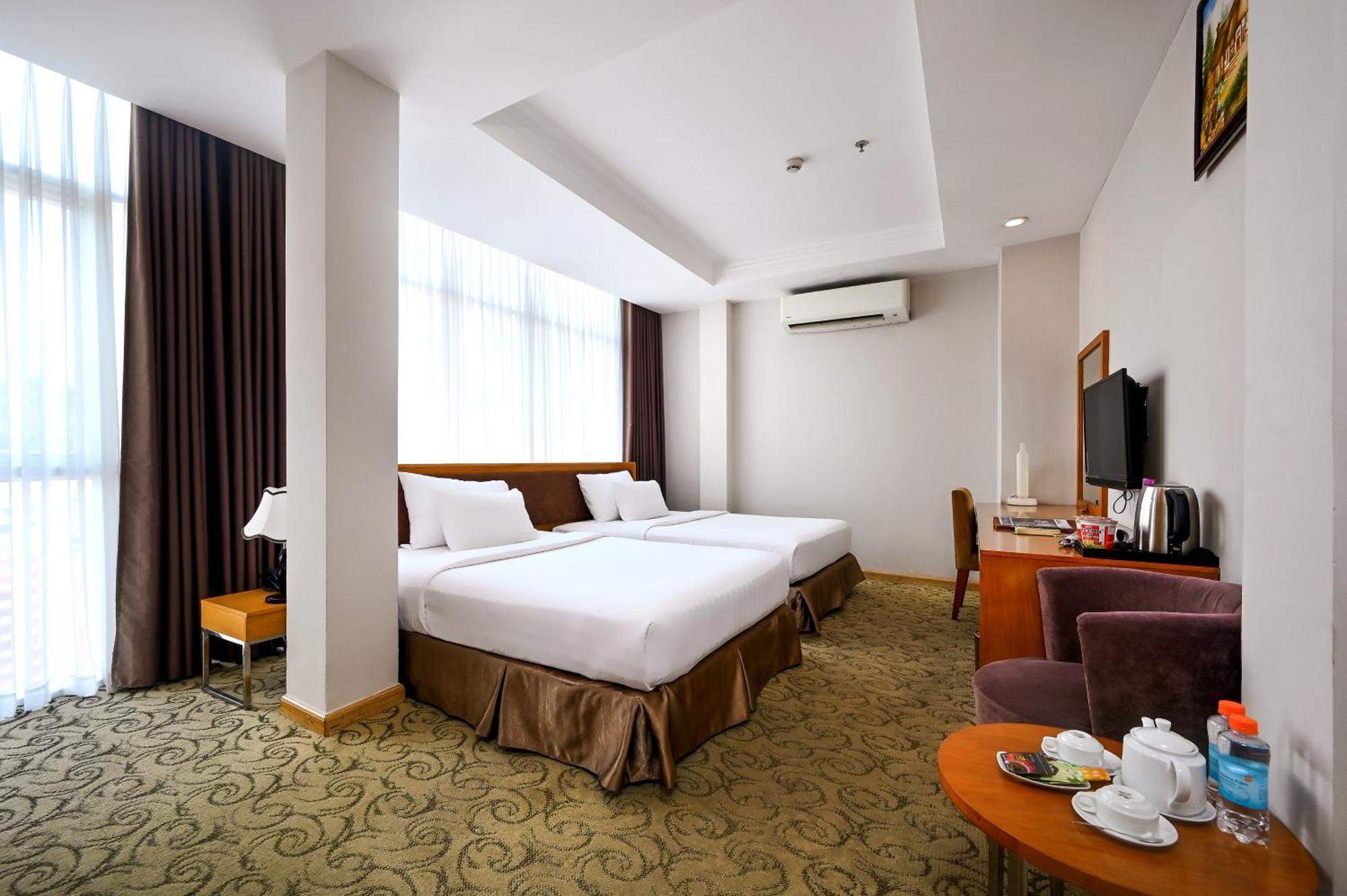 Ttc Hotel Deluxe Airport Хошимин Экстерьер фото